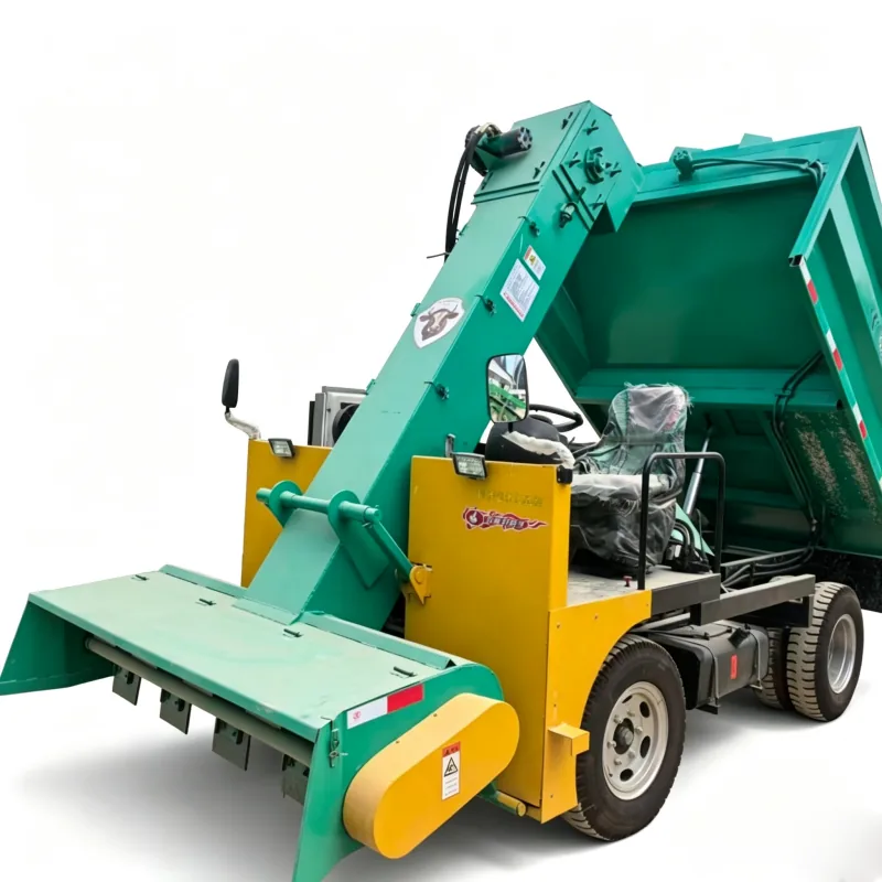 Self-propelled manure collection truck with front scraper